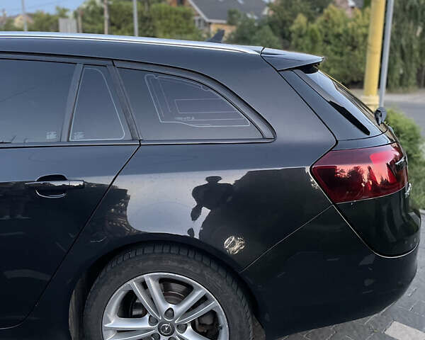 Черный Опель Инсигния, объемом двигателя 1.96 л и пробегом 330 тыс. км за 9000 $, фото 5 на Automoto.ua