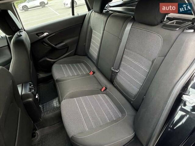 Чорний Опель Інсігнія, об'ємом двигуна 1.96 л та пробігом 328 тис. км за 8250 $, фото 2 на Automoto.ua