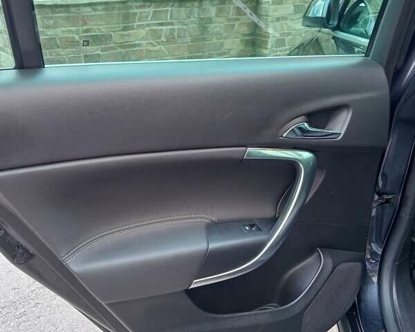 Чорний Опель Інсігнія, об'ємом двигуна 1.96 л та пробігом 198 тис. км за 12500 $, фото 18 на Automoto.ua