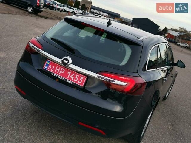 Чорний Опель Інсігнія, об'ємом двигуна 1.96 л та пробігом 205 тис. км за 12999 $, фото 10 на Automoto.ua