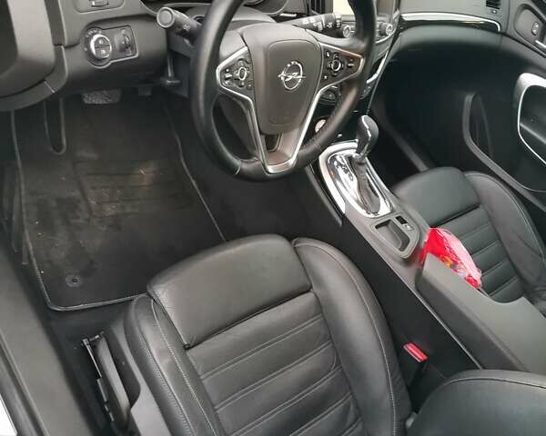 Чорний Опель Інсігнія, об'ємом двигуна 1.96 л та пробігом 205 тис. км за 12999 $, фото 19 на Automoto.ua