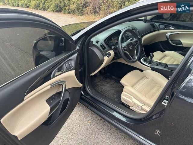 Черный Опель Инсигния, объемом двигателя 2 л и пробегом 240 тыс. км за 8990 $, фото 19 на Automoto.ua