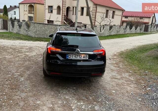Черный Опель Инсигния, объемом двигателя 2 л и пробегом 270 тыс. км за 9500 $, фото 4 на Automoto.ua