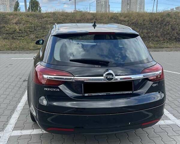 Чорний Опель Інсігнія, об'ємом двигуна 1.96 л та пробігом 328 тис. км за 8250 $, фото 8 на Automoto.ua