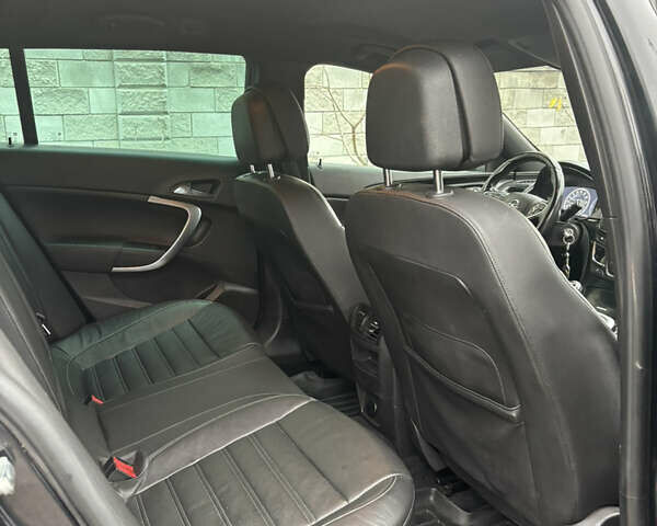 Черный Опель Инсигния, объемом двигателя 1.96 л и пробегом 312 тыс. км за 10500 $, фото 57 на Automoto.ua