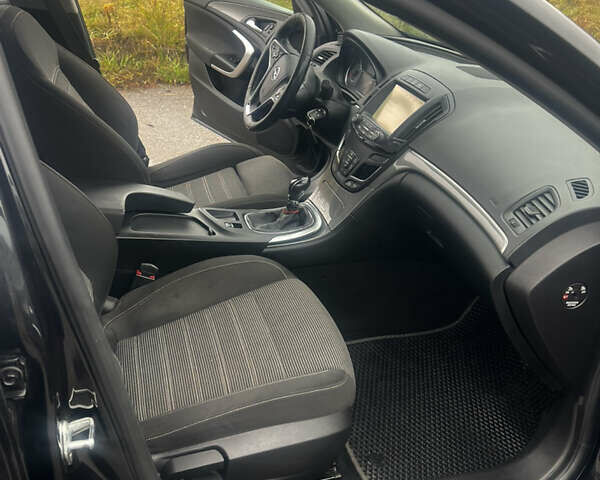 Чорний Опель Інсігнія, об'ємом двигуна 1.6 л та пробігом 210 тис. км за 8400 $, фото 11 на Automoto.ua