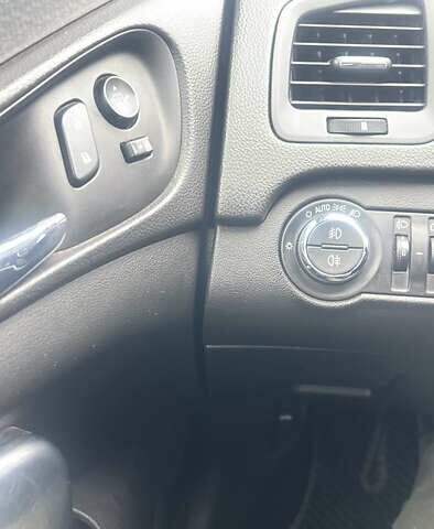 Чорний Опель Інсігнія, об'ємом двигуна 1.6 л та пробігом 210 тис. км за 8400 $, фото 9 на Automoto.ua