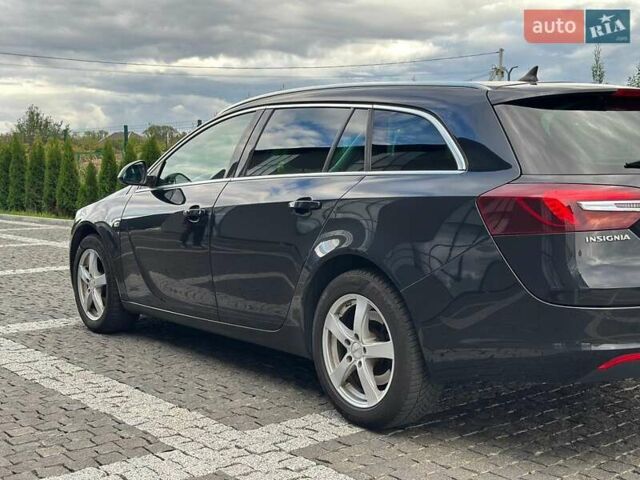 Чорний Опель Інсігнія, об'ємом двигуна 1.96 л та пробігом 250 тис. км за 10500 $, фото 6 на Automoto.ua