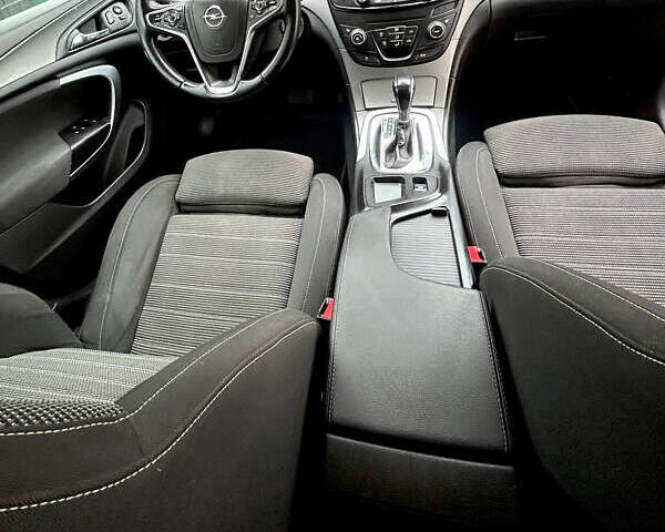 Чорний Опель Інсігнія, об'ємом двигуна 1.6 л та пробігом 304 тис. км за 9100 $, фото 6 на Automoto.ua