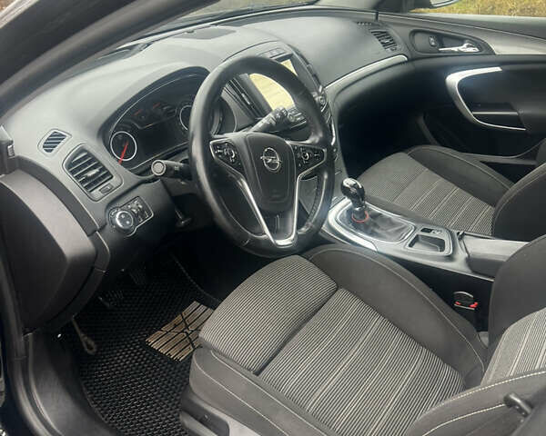 Чорний Опель Інсігнія, об'ємом двигуна 1.6 л та пробігом 210 тис. км за 8400 $, фото 7 на Automoto.ua