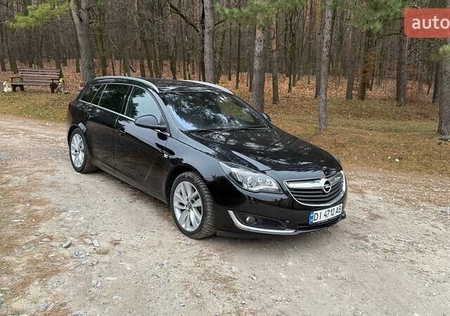 Черный Опель Инсигния, объемом двигателя 2 л и пробегом 270 тыс. км за 9500 $, фото 2 на Automoto.ua