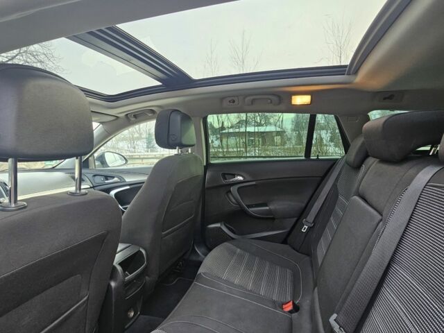 Чорний Опель Інсігнія, об'ємом двигуна 1.6 л та пробігом 280 тис. км за 8750 $, фото 6 на Automoto.ua