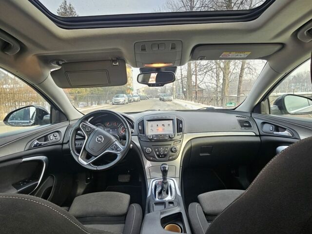 Чорний Опель Інсігнія, об'ємом двигуна 1.6 л та пробігом 280 тис. км за 8750 $, фото 5 на Automoto.ua