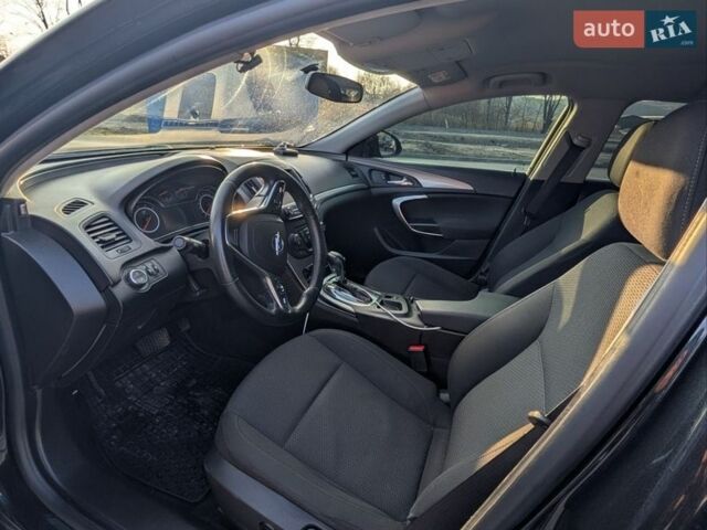 Чорний Опель Інсігнія, об'ємом двигуна 1.96 л та пробігом 247 тис. км за 8300 $, фото 7 на Automoto.ua