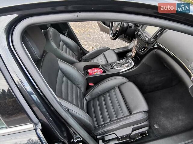 Чорний Опель Інсігнія, об'ємом двигуна 1.96 л та пробігом 205 тис. км за 12999 $, фото 18 на Automoto.ua