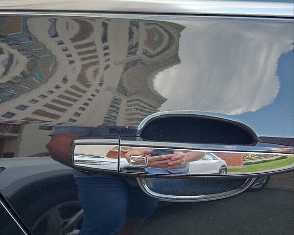 Чорний Опель Інсігнія, об'ємом двигуна 1.96 л та пробігом 198 тис. км за 12500 $, фото 4 на Automoto.ua