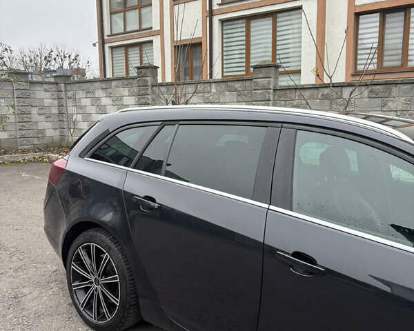 Черный Опель Инсигния, объемом двигателя 1.96 л и пробегом 312 тыс. км за 10500 $, фото 22 на Automoto.ua