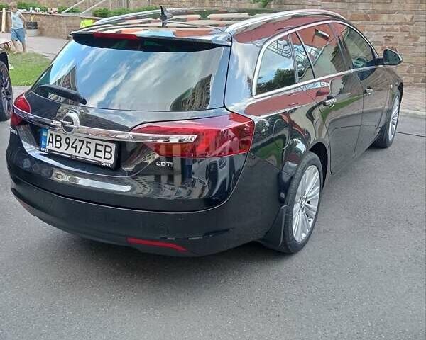 Чорний Опель Інсігнія, об'ємом двигуна 1.96 л та пробігом 198 тис. км за 12500 $, фото 6 на Automoto.ua