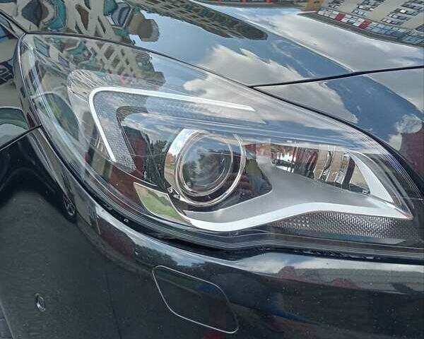 Чорний Опель Інсігнія, об'ємом двигуна 1.96 л та пробігом 198 тис. км за 12500 $, фото 14 на Automoto.ua