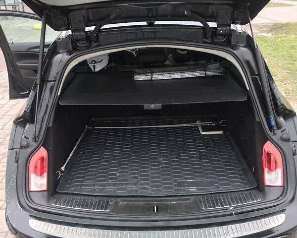 Черный Опель Инсигния, объемом двигателя 1.96 л и пробегом 280 тыс. км за 10000 $, фото 3 на Automoto.ua