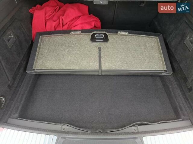 Черный Опель Инсигния, объемом двигателя 2 л и пробегом 252 тыс. км за 9850 $, фото 76 на Automoto.ua