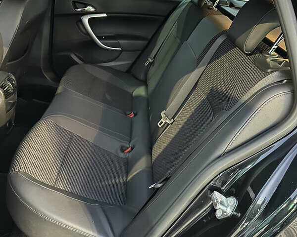 Черный Опель Инсигния, объемом двигателя 1.96 л и пробегом 173 тыс. км за 11500 $, фото 18 на Automoto.ua