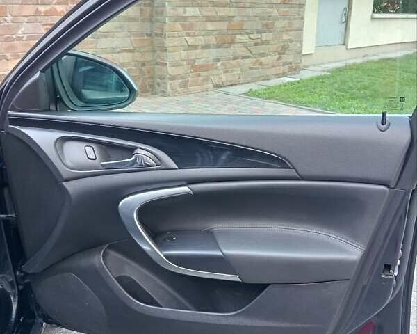 Чорний Опель Інсігнія, об'ємом двигуна 1.96 л та пробігом 198 тис. км за 12500 $, фото 24 на Automoto.ua