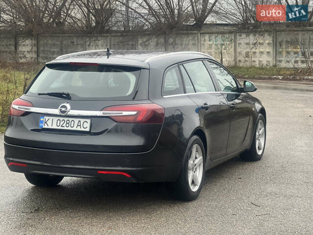 Чорний Опель Інсігнія, об'ємом двигуна 1.6 л та пробігом 210 тис. км за 8400 $, фото 4 на Automoto.ua