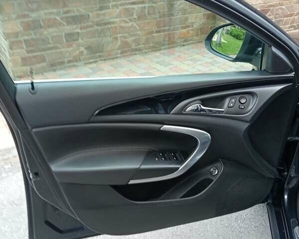 Чорний Опель Інсігнія, об'ємом двигуна 1.96 л та пробігом 198 тис. км за 12500 $, фото 38 на Automoto.ua