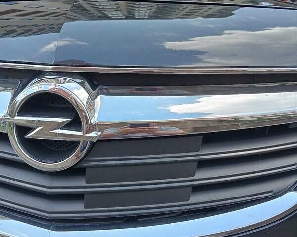 Чорний Опель Інсігнія, об'ємом двигуна 1.96 л та пробігом 198 тис. км за 12500 $, фото 16 на Automoto.ua