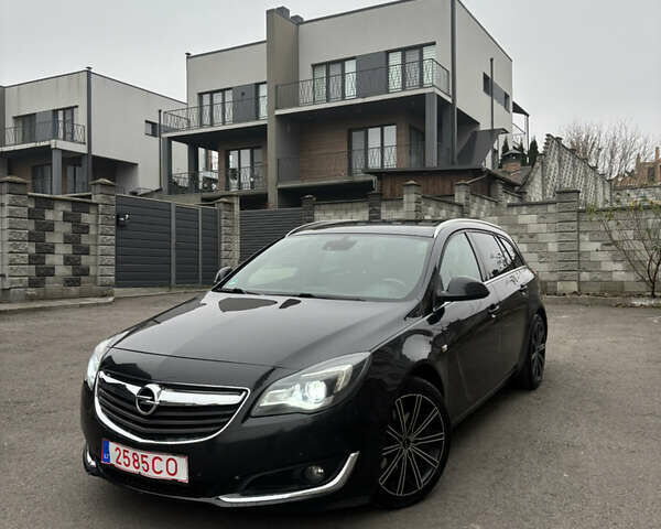 Черный Опель Инсигния, объемом двигателя 1.96 л и пробегом 312 тыс. км за 10500 $, фото 1 на Automoto.ua