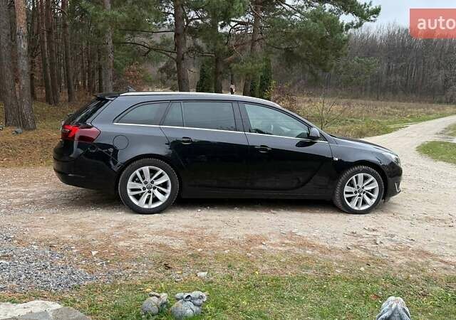 Черный Опель Инсигния, объемом двигателя 2 л и пробегом 270 тыс. км за 9500 $, фото 3 на Automoto.ua