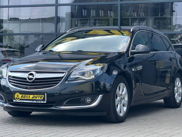 Чорний Опель Інсігнія, об'ємом двигуна 2 л та пробігом 220 тис. км за 12300 $, фото 2 на Automoto.ua