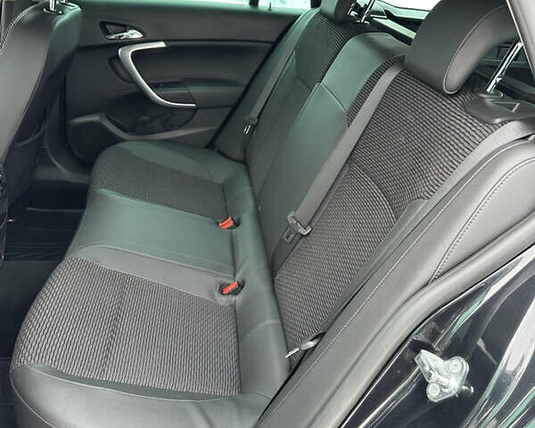 Черный Опель Инсигния, объемом двигателя 1.96 л и пробегом 174 тыс. км за 11500 $, фото 31 на Automoto.ua