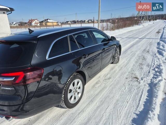 Чорний Опель Інсігнія, об'ємом двигуна 2 л та пробігом 320 тис. км за 9500 $, фото 6 на Automoto.ua