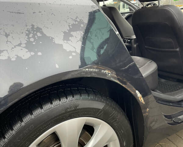 Чорний Опель Інсігнія, об'ємом двигуна 2 л та пробігом 236 тис. км за 8000 $, фото 9 на Automoto.ua