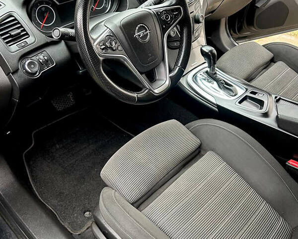 Чорний Опель Інсігнія, об'ємом двигуна 1.6 л та пробігом 304 тис. км за 9100 $, фото 4 на Automoto.ua