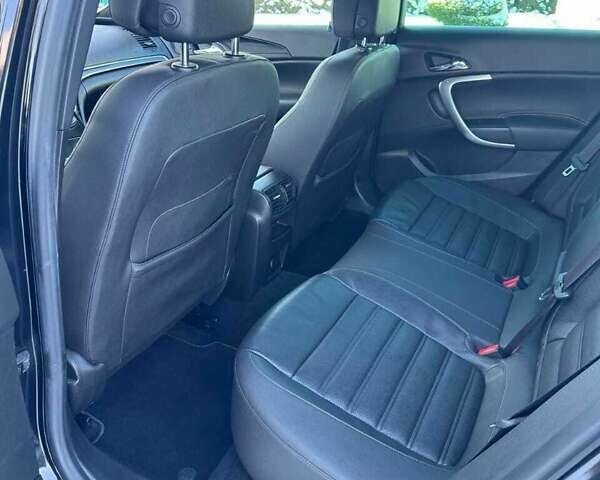 Чорний Опель Інсігнія, об'ємом двигуна 1.96 л та пробігом 165 тис. км за 12850 $, фото 8 на Automoto.ua