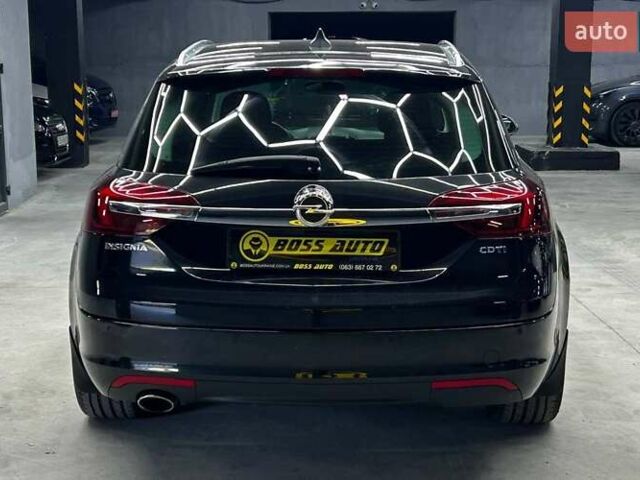 Чорний Опель Інсігнія, об'ємом двигуна 1.96 л та пробігом 324 тис. км за 10800 $, фото 4 на Automoto.ua