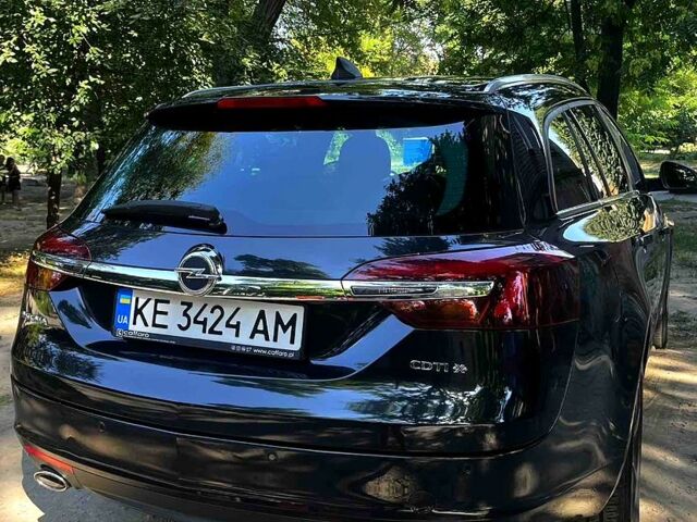 Черный Опель Инсигния, объемом двигателя 2 л и пробегом 218 тыс. км за 10500 $, фото 4 на Automoto.ua