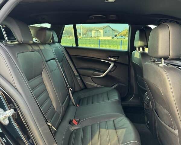 Черный Опель Инсигния, объемом двигателя 2 л и пробегом 160 тыс. км за 11900 $, фото 9 на Automoto.ua