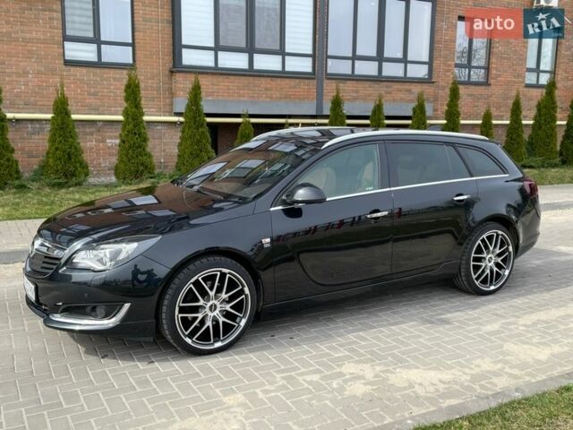 Чорний Опель Інсігнія, об'ємом двигуна 1.96 л та пробігом 238 тис. км за 11500 $, фото 2 на Automoto.ua