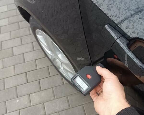 Черный Опель Инсигния, объемом двигателя 1.6 л и пробегом 260 тыс. км за 8750 $, фото 12 на Automoto.ua