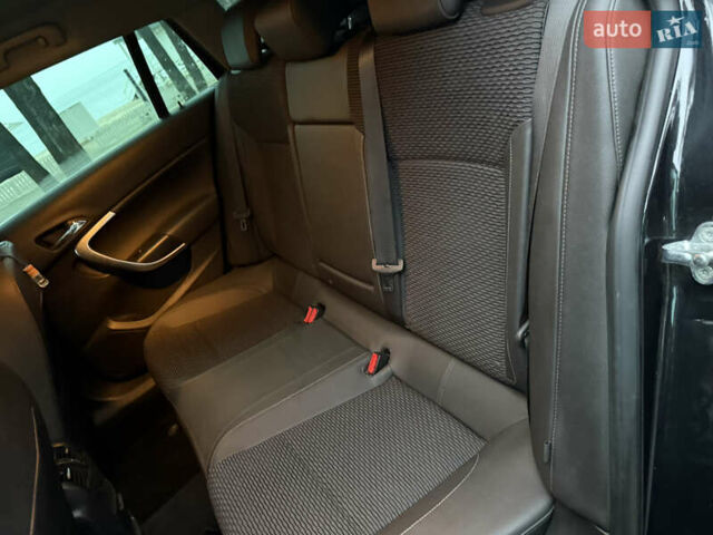 Чорний Опель Інсігнія, об'ємом двигуна 1.6 л та пробігом 276 тис. км за 8700 $, фото 20 на Automoto.ua