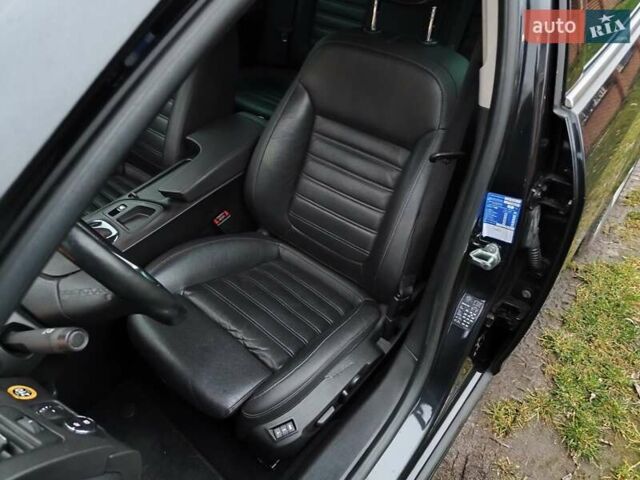 Черный Опель Инсигния, объемом двигателя 1.96 л и пробегом 255 тыс. км за 10999 $, фото 12 на Automoto.ua