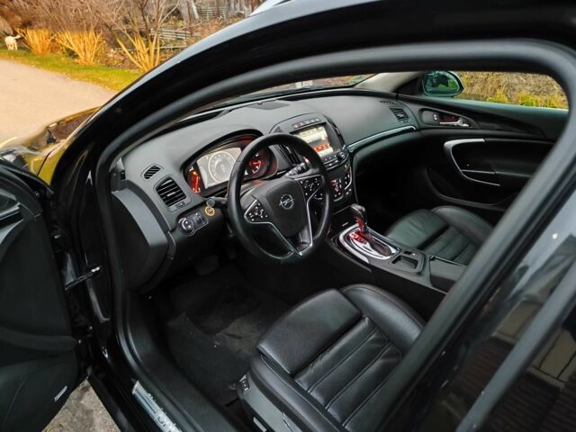 Чорний Опель Інсігнія, об'ємом двигуна 2 л та пробігом 255 тис. км за 10999 $, фото 10 на Automoto.ua