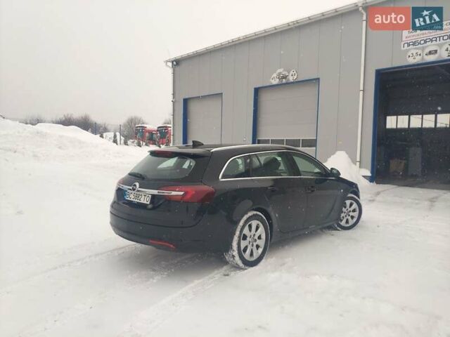 Чорний Опель Інсігнія, об'ємом двигуна 1.6 л та пробігом 208 тис. км за 11500 $, фото 4 на Automoto.ua