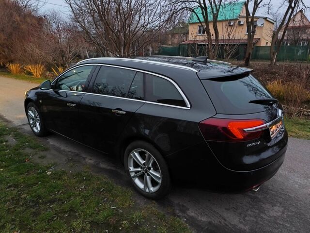 Чорний Опель Інсігнія, об'ємом двигуна 2 л та пробігом 255 тис. км за 10999 $, фото 4 на Automoto.ua