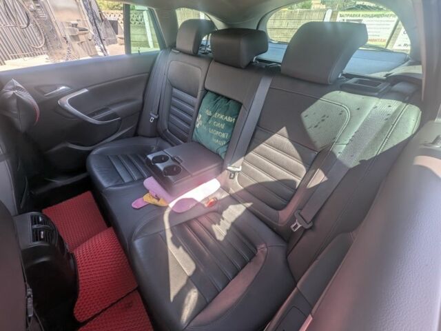 Черный Опель Инсигния, объемом двигателя 2 л и пробегом 290 тыс. км за 10905 $, фото 4 на Automoto.ua