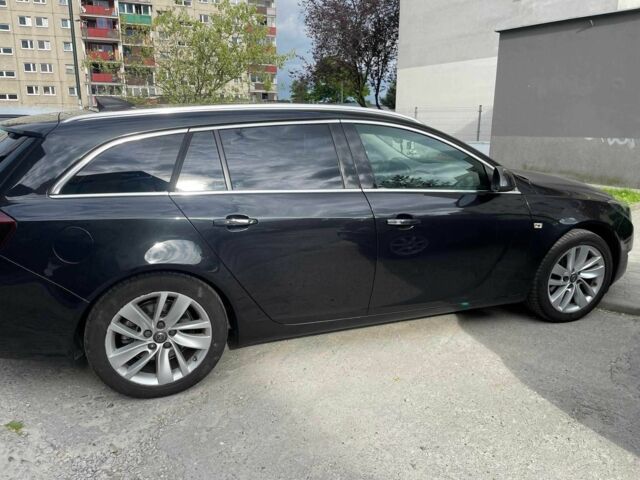 Черный Опель Инсигния, объемом двигателя 2 л и пробегом 219 тыс. км за 6386 $, фото 1 на Automoto.ua